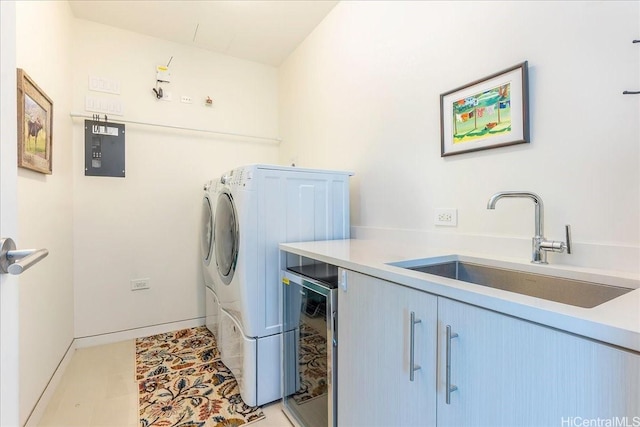 1118 Ala Moana Blvd Unit 2505, Honolulu, HI 96814 - laundry room with washing machine and dryer, beverage cooler, cabinet space, and electric panel