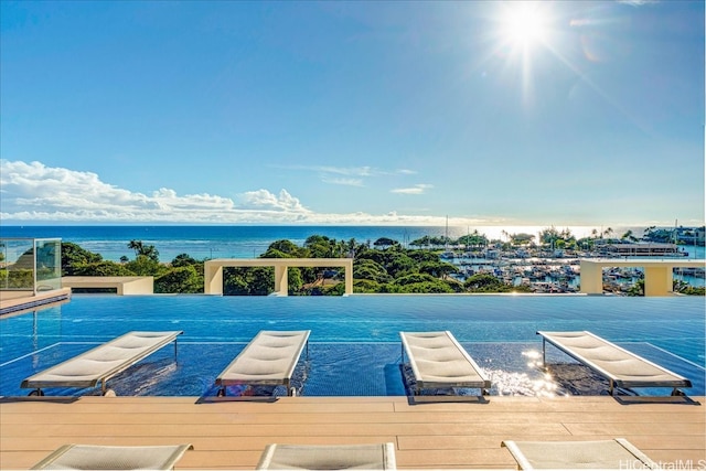 1118 Ala Moana Blvd Unit 2505, Honolulu, HI 96814 - view of swimming pool featuring a water view