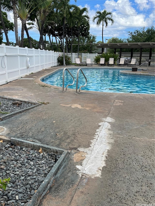 91-1059 Puamaeole St Unit 5W, Ewa Beach, HI 96706 - community pool featuring a patio area