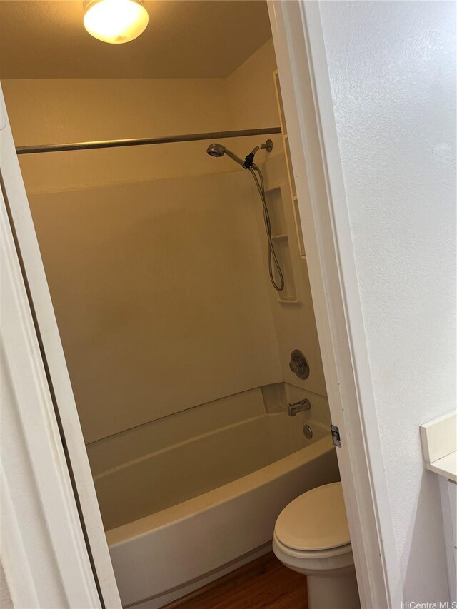 91-1059 Puamaeole St Unit 5W, Ewa Beach, HI 96706 - full bath with wood finished floors, toilet, and tub / shower combination
