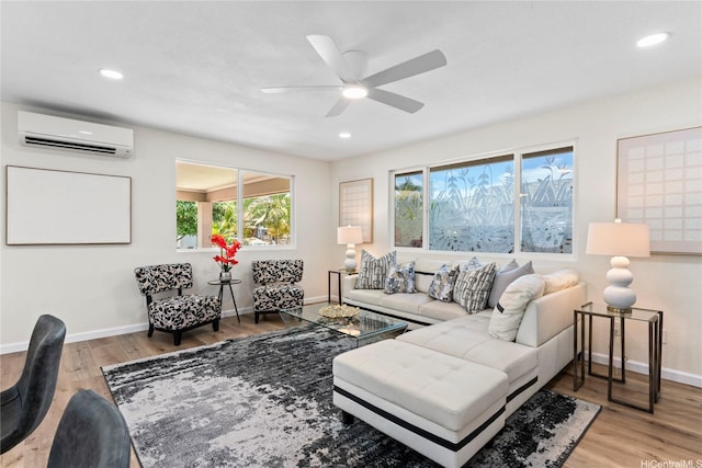 85-310 Kohai Pl, Waianae, HI 96792 - living area featuring an AC wall unit, baseboards, a ceiling fan, wood finished floors, and recessed lighting