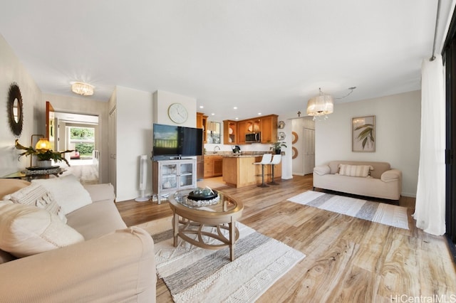 46-55 Meheanu Pl Unit 3441, Kaneohe, HI 96744 - living room featuring light wood-style floors and baseboards