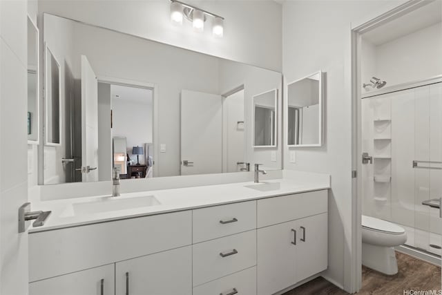 91-1774 Kohanahana Loop, Ewa Beach, HI 96706 - bathroom with double vanity, a stall shower, and wood finished floors