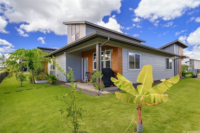 91-1774 Kohanahana Loop, Ewa Beach, HI 96706 - back of property featuring a lawn