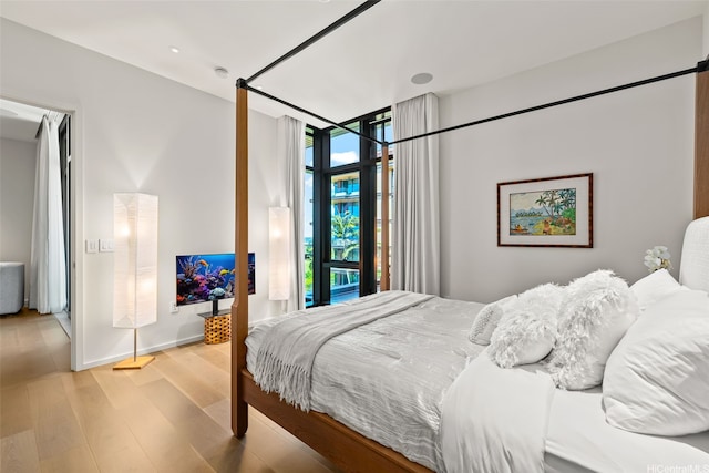 1388 Ala Moana Blvd Unit 5603, Honolulu, HI 96814 - bedroom with wood finished floors and recessed lighting