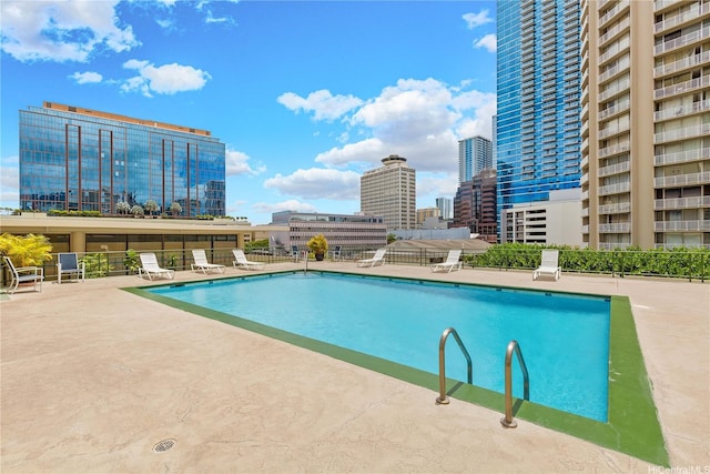 747 Amana St Unit 1607, Honolulu, HI 96814 - community pool featuring a city view and a patio