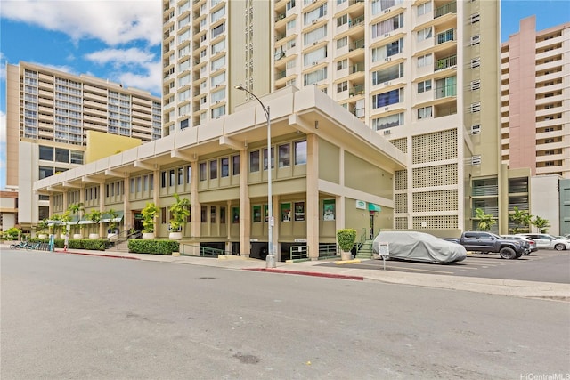 747 Amana St Unit 1607, Honolulu, HI 96814 - view of apartment building / complex featuring uncovered parking