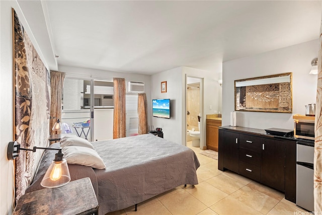 2463 Kuhio Ave Unit 607, Honolulu, HI 96815 - bedroom featuring light tile patterned floors, an AC wall unit, and connected bathroom