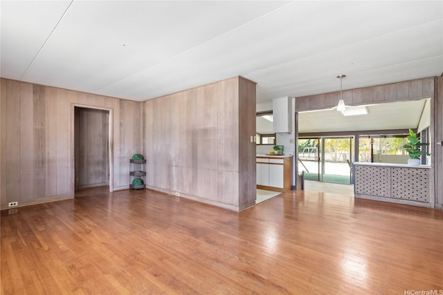 45-258 Halemuku Pl, Kaneohe, HI 96744 - unfurnished living room featuring wood finished floors and wooden walls