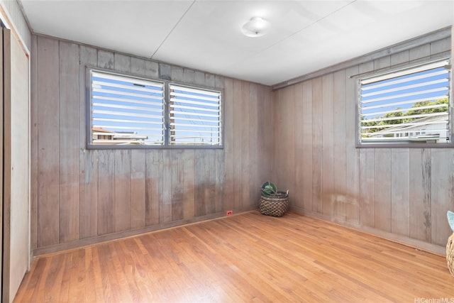45-258 Halemuku Pl, Kaneohe, HI 96744 - spare room featuring wood finished floors, plenty of natural light, and wooden walls