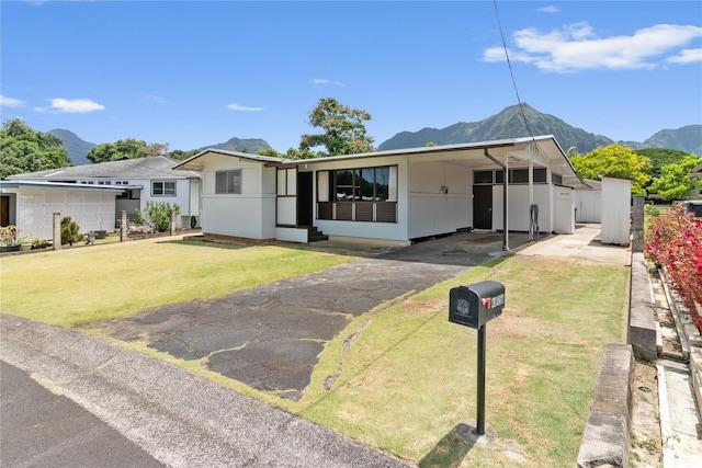 45-258 Halemuku Pl, Kaneohe, HI 96744 - ranch-style home with a mountain view, asphalt driveway, an attached carport, entry steps, and stucco siding