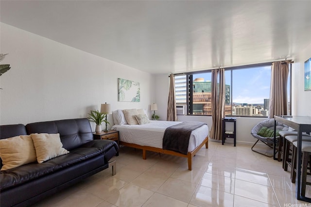 444 Niu St Unit 3508, Honolulu, HI 96815 - bedroom with light tile patterned floors, multiple windows, and baseboards