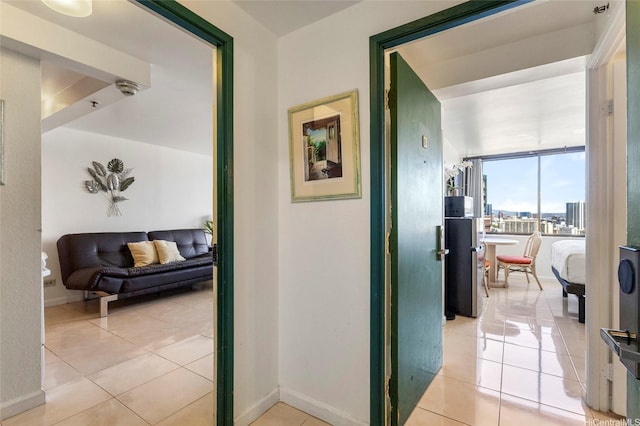 444 Niu St Unit 3508, Honolulu, HI 96815 - corridor featuring light tile patterned floors and baseboards