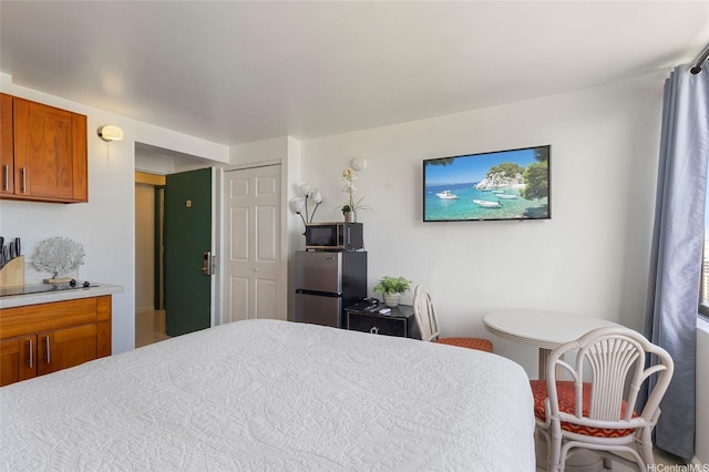 444 Niu St Unit 3508, Honolulu, HI 96815 - bedroom featuring freestanding refrigerator