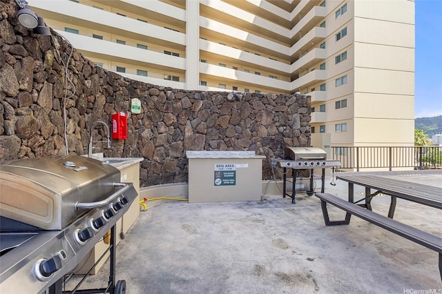 444 Niu St Unit 3508, Honolulu, HI 96815 - view of patio featuring area for grilling and a sink