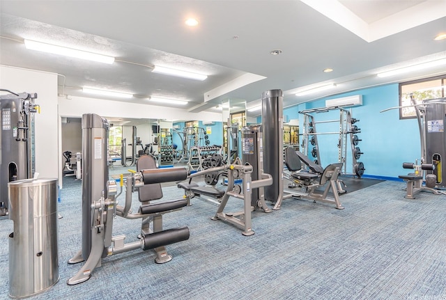 343 Hobron Ln Unit 4302, Honolulu, HI 96815 - exercise room with a wall mounted air conditioner, carpet, and recessed lighting