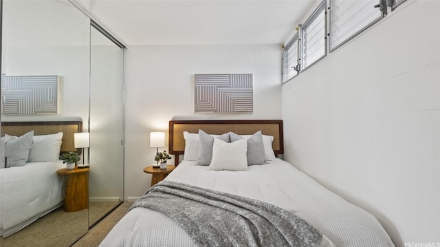 949 Ala Nanala St Unit 1201, Honolulu, HI 96818 - carpeted bedroom featuring a closet and baseboards