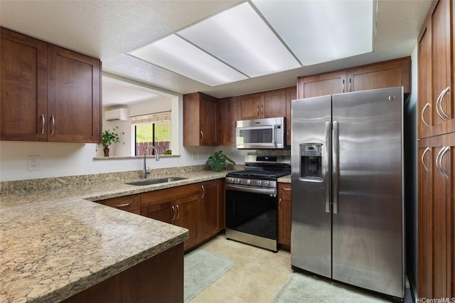 98-130 Lania Way Unit 42, Aiea, HI 96701 - kitchen with appliances with stainless steel finishes, a sink, and a wall mounted air conditioner