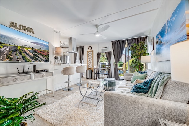 1002 S Kihei Rd Unit 205, Kihei, HI 96753 - living area with a ceiling fan and wood finished floors