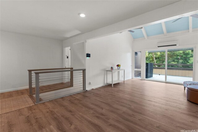 47-730 Hui Kelu St Unit 4404, Kaneohe, HI 96744 - unfurnished living room featuring a wall mounted AC, wood finished floors, baseboards, and a ceiling fan