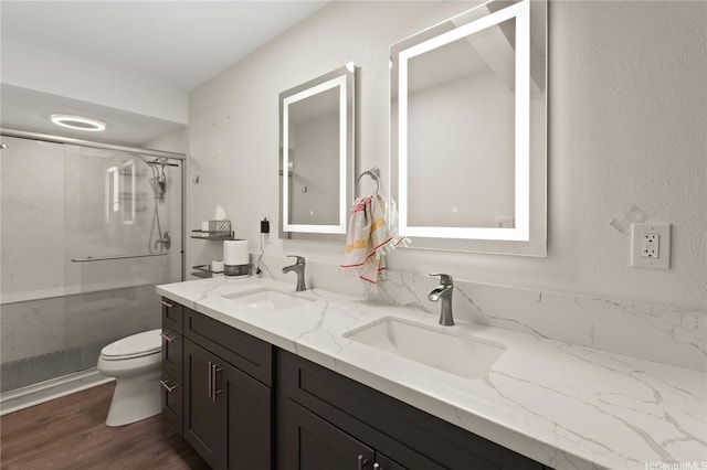 47-730 Hui Kelu St Unit 4404, Kaneohe, HI 96744 - full bath with double vanity, toilet, a shower stall, and wood finished floors