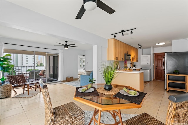 222 Kaiulani Ave Unit Ph3, Honolulu, HI 96815 - dining room featuring ceiling fan, plenty of natural light, and rail lighting