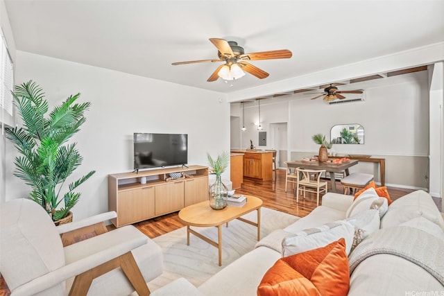 3037 Hinano St, Honolulu, HI 96815 - living room featuring ceiling fan, light wood-style flooring, and baseboards