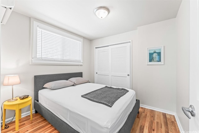 3037 Hinano St, Honolulu, HI 96815 - bedroom with a closet, wood finished floors, and baseboards