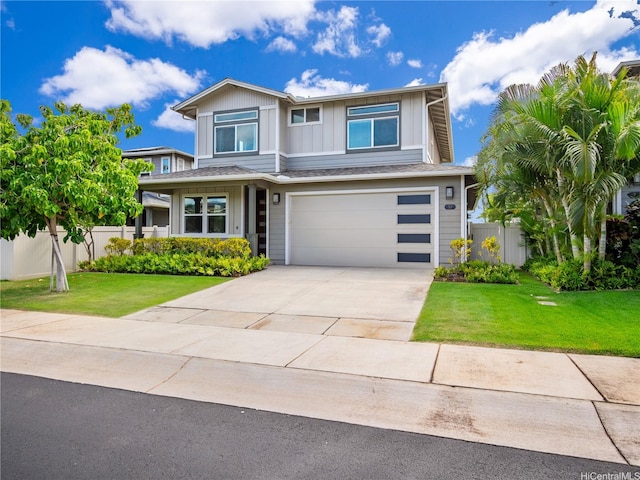91-5408 Kapolei Pkwy Unit 37, Kapolei, HI 96707 - view of front of house with driveway, a garage, and board and batten siding