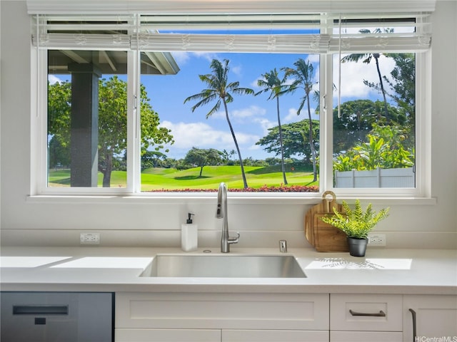 91-5408 Kapolei Pkwy Unit 37, Kapolei, HI 96707 - kitchen featuring stainless steel dishwasher, light countertops, white cabinetry, and golf course view