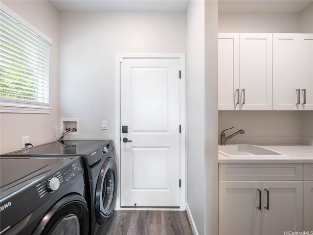 91-5408 Kapolei Pkwy Unit 37, Kapolei, HI 96707 - washroom featuring cabinet space, washer and clothes dryer, and dark wood-type flooring