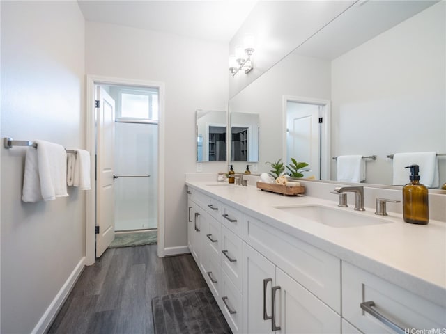 91-5408 Kapolei Pkwy Unit 37, Kapolei, HI 96707 - bathroom with double vanity, wood finished floors, and a stall shower