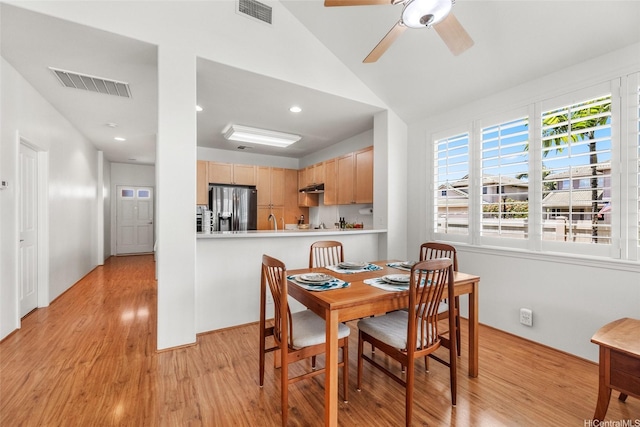 91-818 Lualai St Unit 69, Ewa Beach, HI 96706 - dining room with light wood-style floors, ceiling fan, vaulted ceiling, and recessed lighting