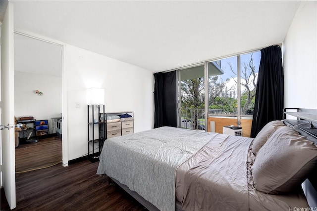 1600 Wilikina Dr Unit A403, Wahiawa, HI 96786 - bedroom featuring dark wood-style flooring and expansive windows