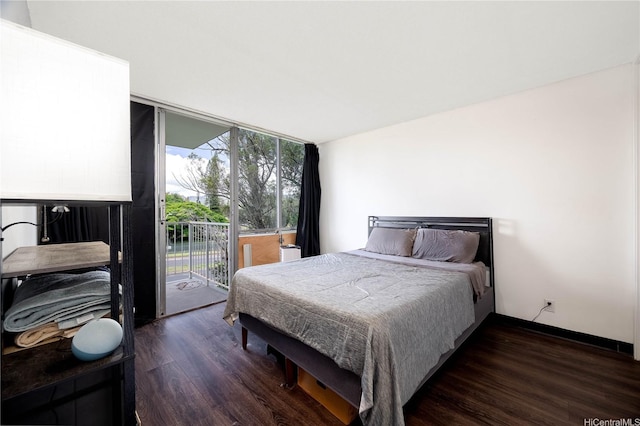 1600 Wilikina Dr Unit A403, Wahiawa, HI 96786 - bedroom featuring dark wood-style floors, access to exterior, and expansive windows