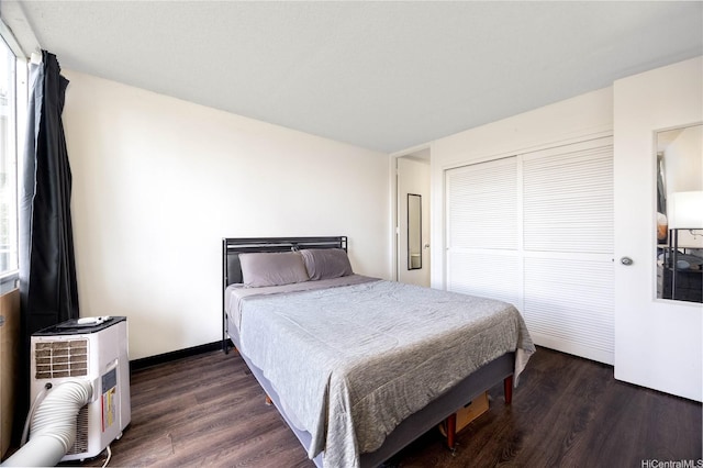 1600 Wilikina Dr Unit A403, Wahiawa, HI 96786 - bedroom featuring dark wood finished floors and a closet