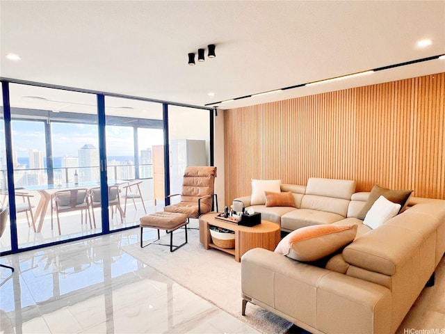 581 Kamoku St Unit 3906, Honolulu, HI 96826 - living room with expansive windows, a skyline view, and light marble finish flooring