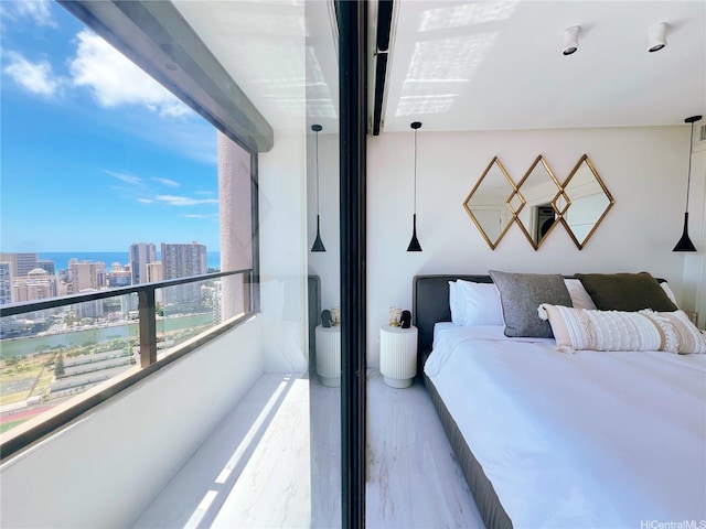 581 Kamoku St Unit 3906, Honolulu, HI 96826 - bedroom featuring a view of city and a water view