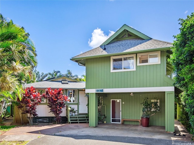 58-015 Maika Pl, Haleiwa, HI 96712 - view of front facade with a shingled roof