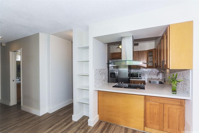 3138 Waialae Ave Unit 114, Honolulu, HI 96816 - kitchen featuring island range hood, black electric stovetop, dark wood finished floors, tasteful backsplash, and a textured ceiling