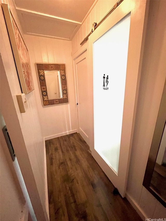 91-1708 Bond St, Ewa Beach, HI 96706 - hallway featuring dark wood finished floors and baseboards