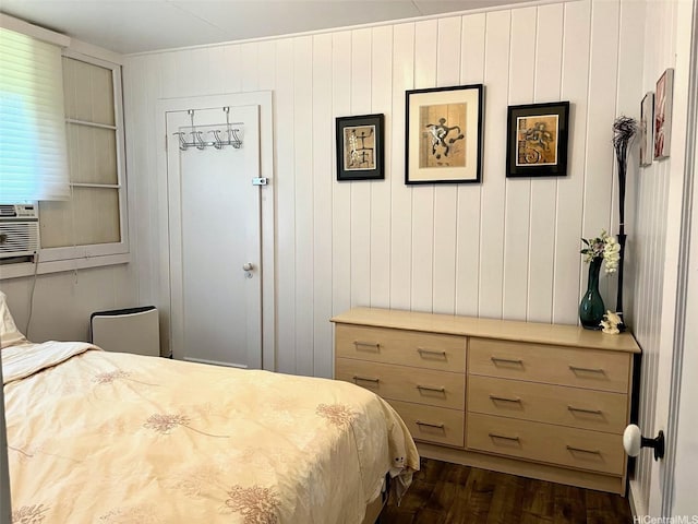 91-1708 Bond St, Ewa Beach, HI 96706 - bedroom with dark wood finished floors and wooden walls