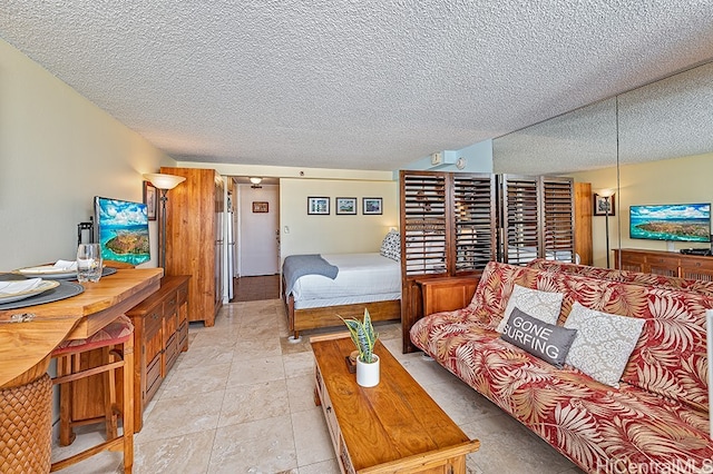 445 Seaside Ave Unit 1618, Honolulu, HI 96815 - living area featuring a textured ceiling