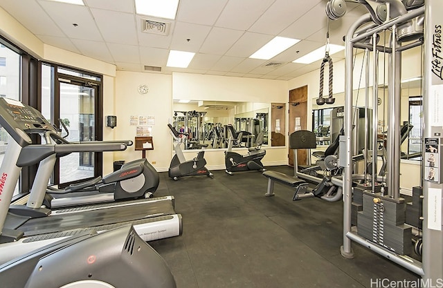 445 Seaside Ave Unit 1618, Honolulu, HI 96815 - gym featuring a drop ceiling and plenty of natural light