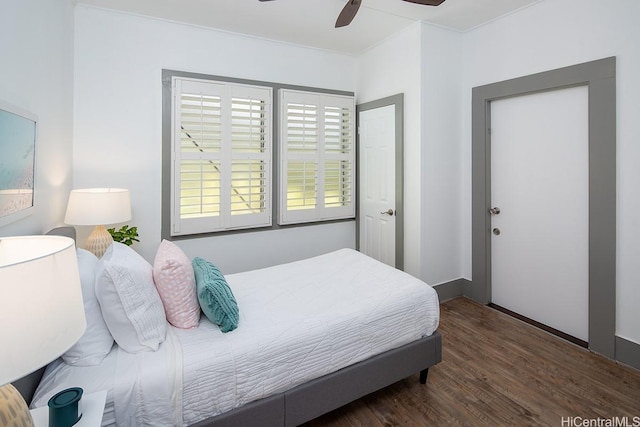 bedroom with wood finished floors and a ceiling fan