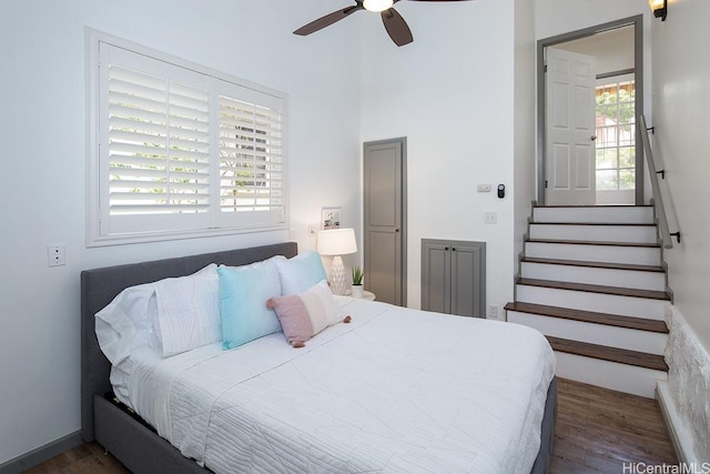 bedroom with wood finished floors and ceiling fan