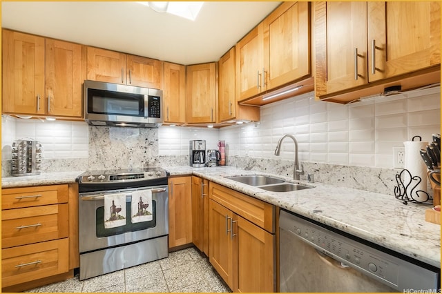 1888 Kalakaua Ave Unit 807, Honolulu, HI 96815 - kitchen featuring stainless steel appliances, a sink, granite tiled floors, tasteful backsplash, and light stone countertops