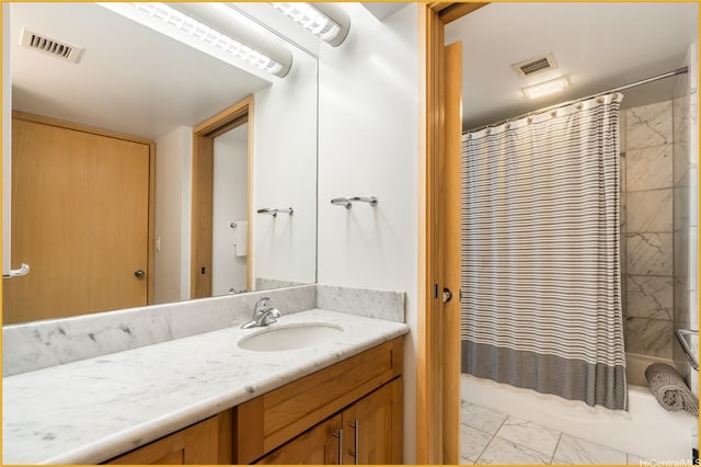 1888 Kalakaua Ave Unit 807, Honolulu, HI 96815 - full bath featuring marble finish flooring, vanity, and shower / tub combo with curtain