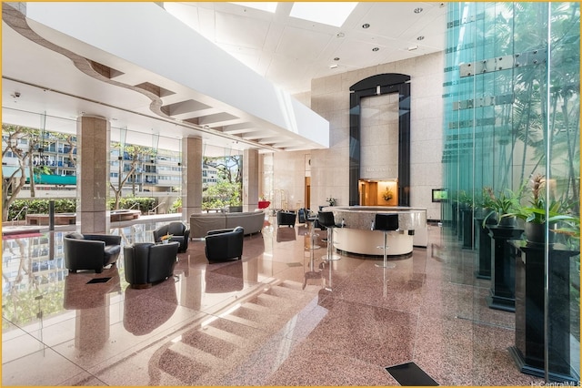 1888 Kalakaua Ave Unit 807, Honolulu, HI 96815 - building lobby featuring a high ceiling and recessed lighting