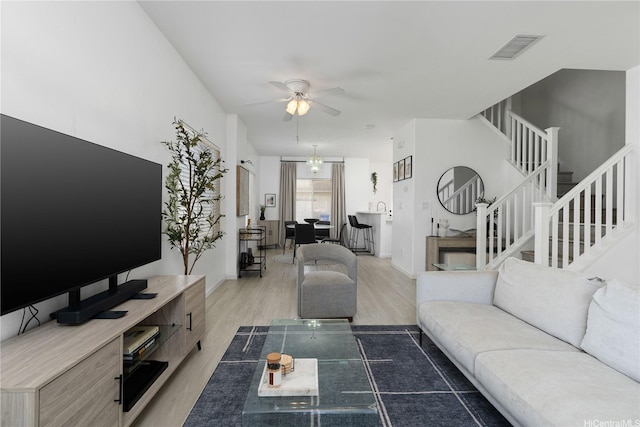 91-1059 Kaimalie St Unit 2P1, Ewa Beach, HI 96706 - living area featuring stairway, light wood-style floors, and a ceiling fan